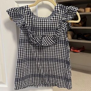 Sleeveless navy and white gingham blouse